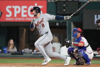 Jul 19, 2025; Arlington, Texas, USA; Detroit Tigers center fielder Matt Vierling (8) follows through on his single against the Texas Rangers during the seventh inning at Globe Life Field. Mandatory Credit: Jim Cowsert-Imagn Images