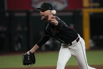 Jul 19, 2025; Phoenix, Arizona, USA; Arizona Diamondbacks pitcher Kyle Backhus (43) throws against the St. Louis Cardinals in the ninth inning at Chase Field. Mandatory Credit: Rick Scuteri-Imagn Images