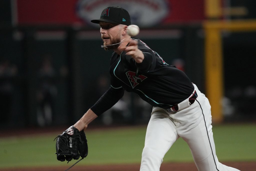 Jul 19, 2025; Phoenix, Arizona, USA; Arizona Diamondbacks pitcher Kyle Backhus (43) throws against the St. Louis Cardinals in the ninth inning at Chase Field. Mandatory Credit: Rick Scuteri-Imagn Images