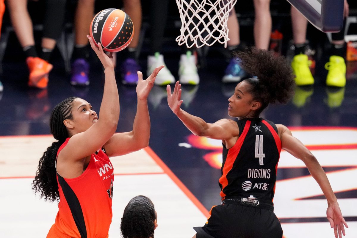 Atlanta Dream's Brionna Jones (24) goes up at the basket while being guarded by Seattle Storm's Skylar Diggins (4) on Saturday, July 19, 2025, during the WNBA All-Star Game at Gainbridge Fieldhouse in Indianapolis.