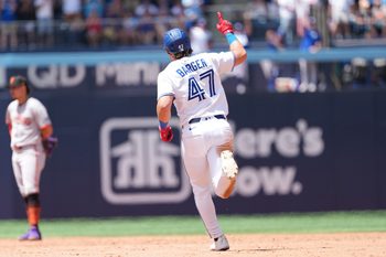 Jul 20, 2025; Toronto, Ontario, CAN; Toronto Blue Jays right fielder Addison Barger (47) runs the bases after hitting a two run home run against the San Francisco Giants during the fifth inning at Rogers Centre. Mandatory Credit: Nick Turchiaro-Imagn Images