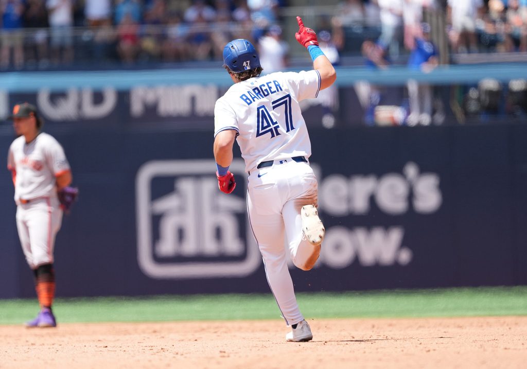 Jul 20, 2025; Toronto, Ontario, CAN; Toronto Blue Jays right fielder Addison Barger (47) runs the bases after hitting a two run home run against the San Francisco Giants during the fifth inning at Rogers Centre. Mandatory Credit: Nick Turchiaro-Imagn Images