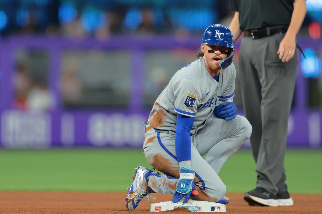 Jul 20, 2025; Miami, Florida, USA; Kansas City Royals shortstop Bobby Witt Jr. (7) looks on from second base after hitting a double against the Miami Marlins during the fourth inning at loanDepot Park. Mandatory Credit: Sam Navarro-Imagn Images