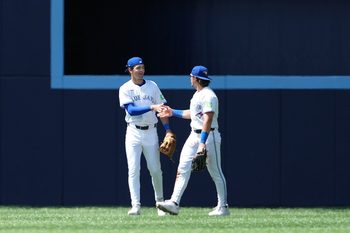 Jul 20, 2025; Toronto, Ontario, CAN; Toronto Blue Jays centre fielder Joey Loperfido (10) celebrates the win with right fielder Addison Barger (47) against the San Francisco Giants at the end of the ninth inning at Rogers Centre. Mandatory Credit: Nick Turchiaro-Imagn Images