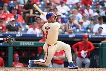 Jul 20, 2025; Philadelphia, Pennsylvania, USA; Philadelphia Phillies first base Otto Kemp (4) watches his home run during the sixth inning against the Los Angeles Angels at Citizens Bank Park. Mandatory Credit: Eric Hartline-Imagn Images