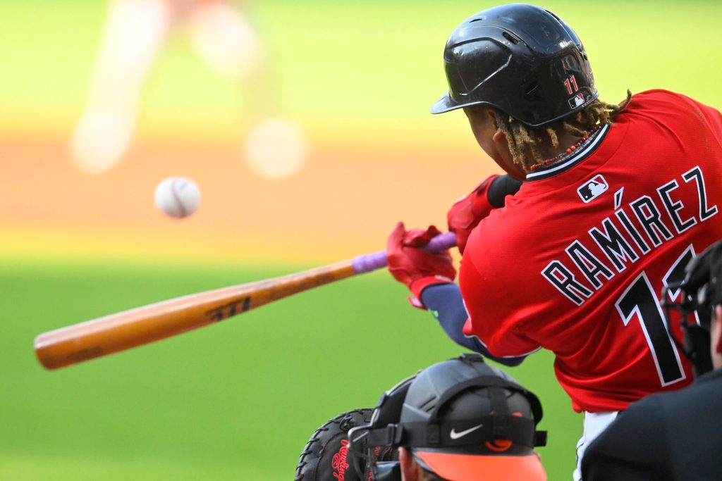 Jul 21, 2025; Cleveland, Ohio, USA; Cleveland Guardians third baseman Jose Ramirez (11) hits a three-run home run in the first inning against the Baltimore Orioles at Progressive Field. Mandatory Credit: David Richard-Imagn Images