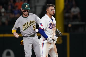 July 21, 2025; Arlington, Texas, USA; Texas Rangers designated hitter Cody Freeman (39) reacts at second base after collecting his first major league hit, an RBI double during the fifth inning against the Athletics at Globe Life Field. Mandatory Credit: Raymond Carlin III-Imagn Images