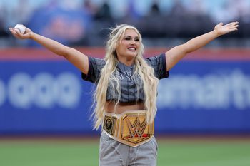 Jul 21, 2025; New York City, New York, USA; Professional wrestler Tiffany Stratton gestures before a ceremonial first pitch before a game between the New York Mets and the Los Angeles Angels at Citi Field. Mandatory Credit: Brad Penner-Imagn Images