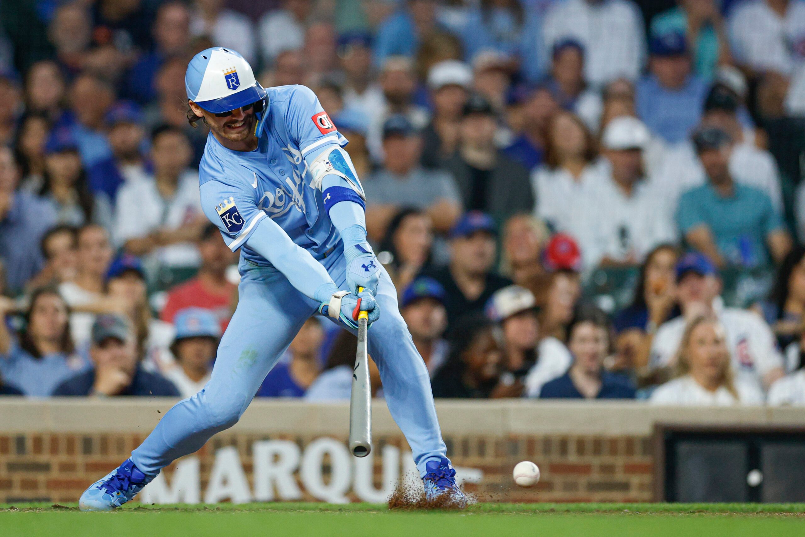 Jul 21, 2025; Chicago, Illinois, USA; Kansas City Royals shortstop Bobby Witt Jr. (7) hits an RBI-single against the Chicago Cubs during the fifth inning at Wrigley Field. Mandatory Credit: Kamil Krzaczynski-Imagn Images