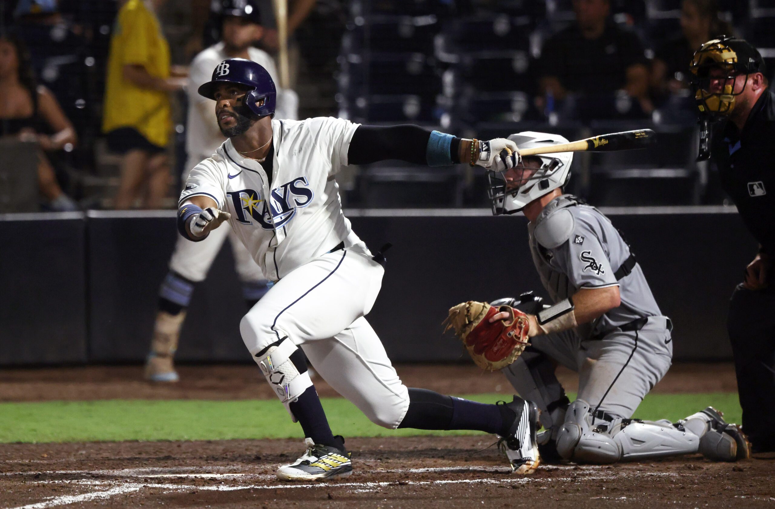Jul 21, 2025; St. Petersburg, Florida, USA; Tampa Bay Rays designated hitter Yandy Diaz (2) hits a home run during the seventh inning against the Chicago White Sox at George M. Steinbrenner Field. Mandatory Credit: Kim Klement Neitzel-Imagn Images