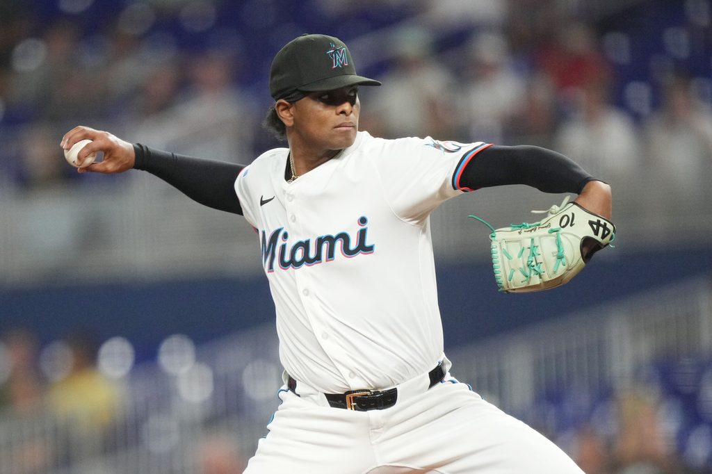 Jul 22, 2025; Miami, Florida, USA; Miami Marlins pitcher Edward Cabrera (27) pitches in the first inning against the San Diego Padres at loanDepot Park. Mandatory Credit: Jim Rassol-Imagn Images