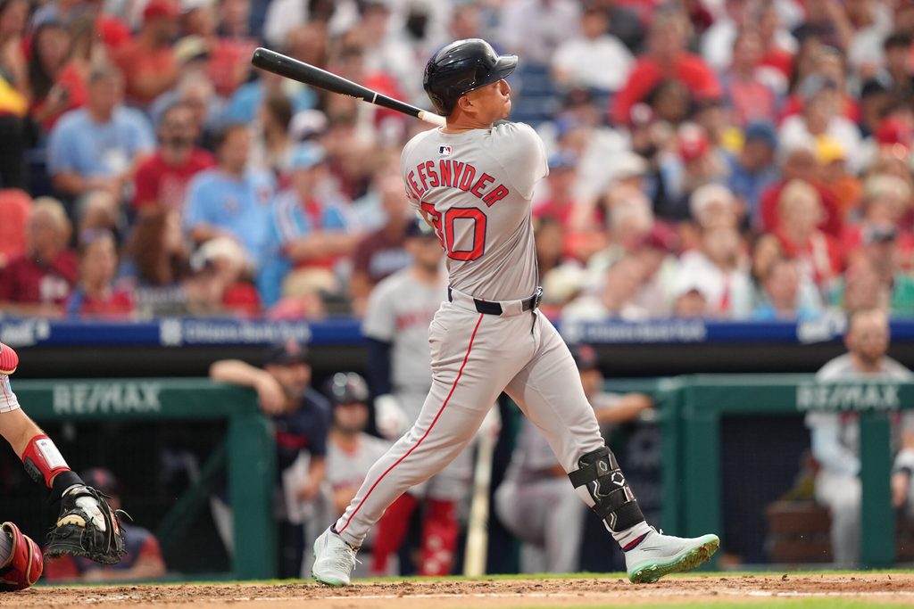 Jul 22, 2025; Philadelphia, Pennsylvania, USA; Boston Red Sox outfielder Rob Refsnyder (30) hits a home run against the Philadelphia Phillies in the fourth inning at Citizens Bank Park. Mandatory Credit: Kyle Ross-Imagn Images