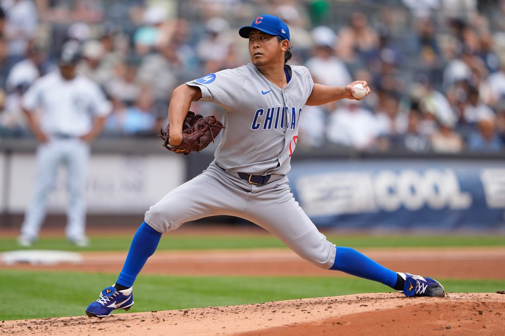 Jul 13, 2025; Bronx, New York, USA; Chicago Cubs pitcher Shota Imanaga (18) delivers a pitch against the New York Yankees during the second inning at Yankee Stadium. Mandatory Credit: Gregory Fisher-Imagn Images