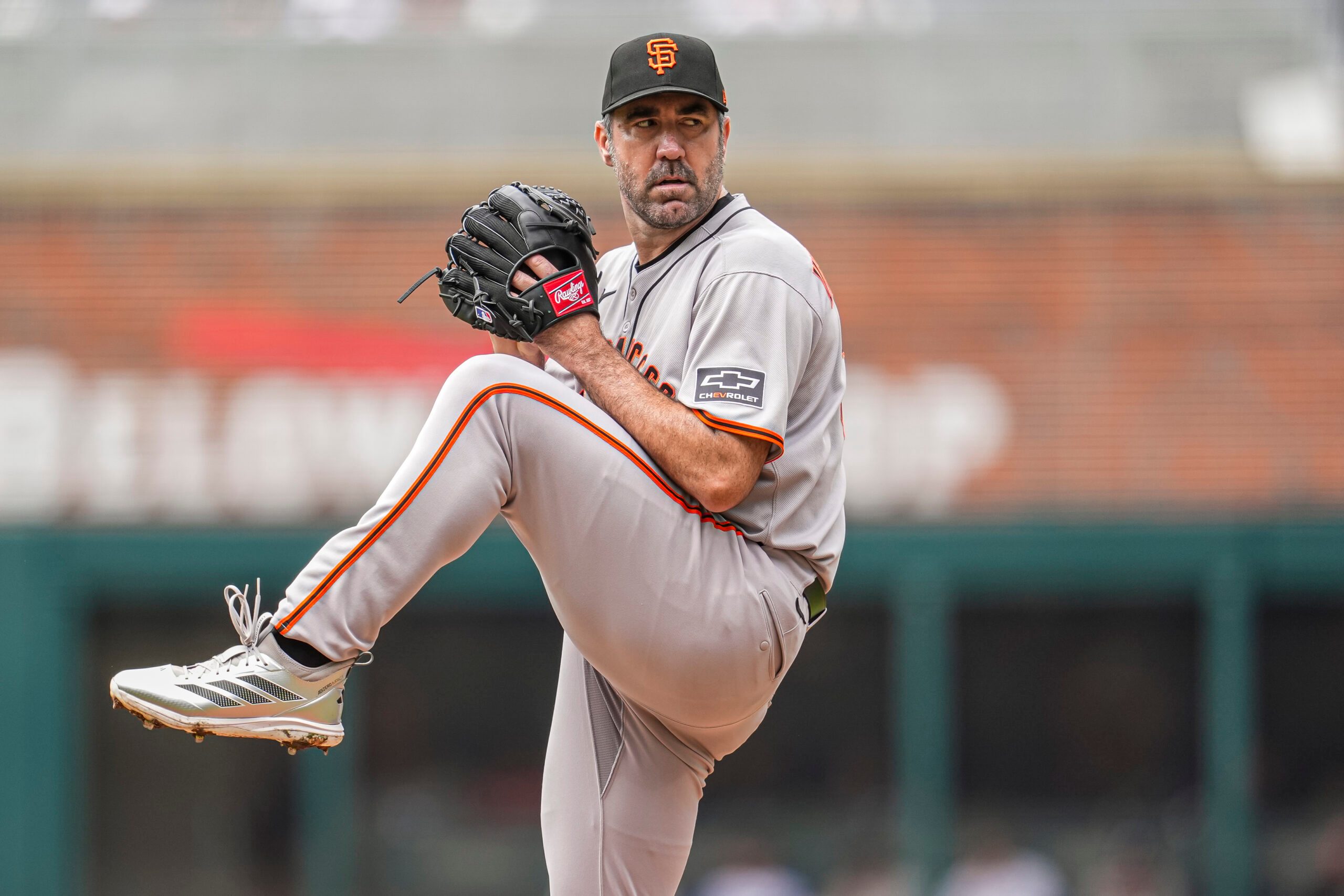Jul 23, 2025; Cumberland, Georgia, USA; San Francisco Giants starting pitcher Justin Verlander (35) pitches against the Atlanta Braves during the first inning at Truist Park. Mandatory Credit: Dale Zanine-Imagn Images