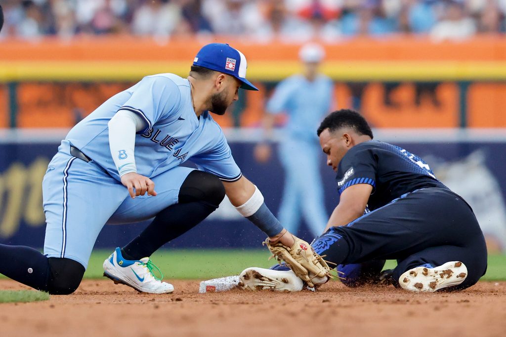 Jul 25, 2025; Detroit, Michigan, USA; Detroit Tigers outfielder Wenceel Perez (46) steals second ahead of Toronto Blue Jays shortstop Bo Bichette (11) in the second inning at Comerica Park. Mandatory Credit: Rick Osentoski-Imagn Images