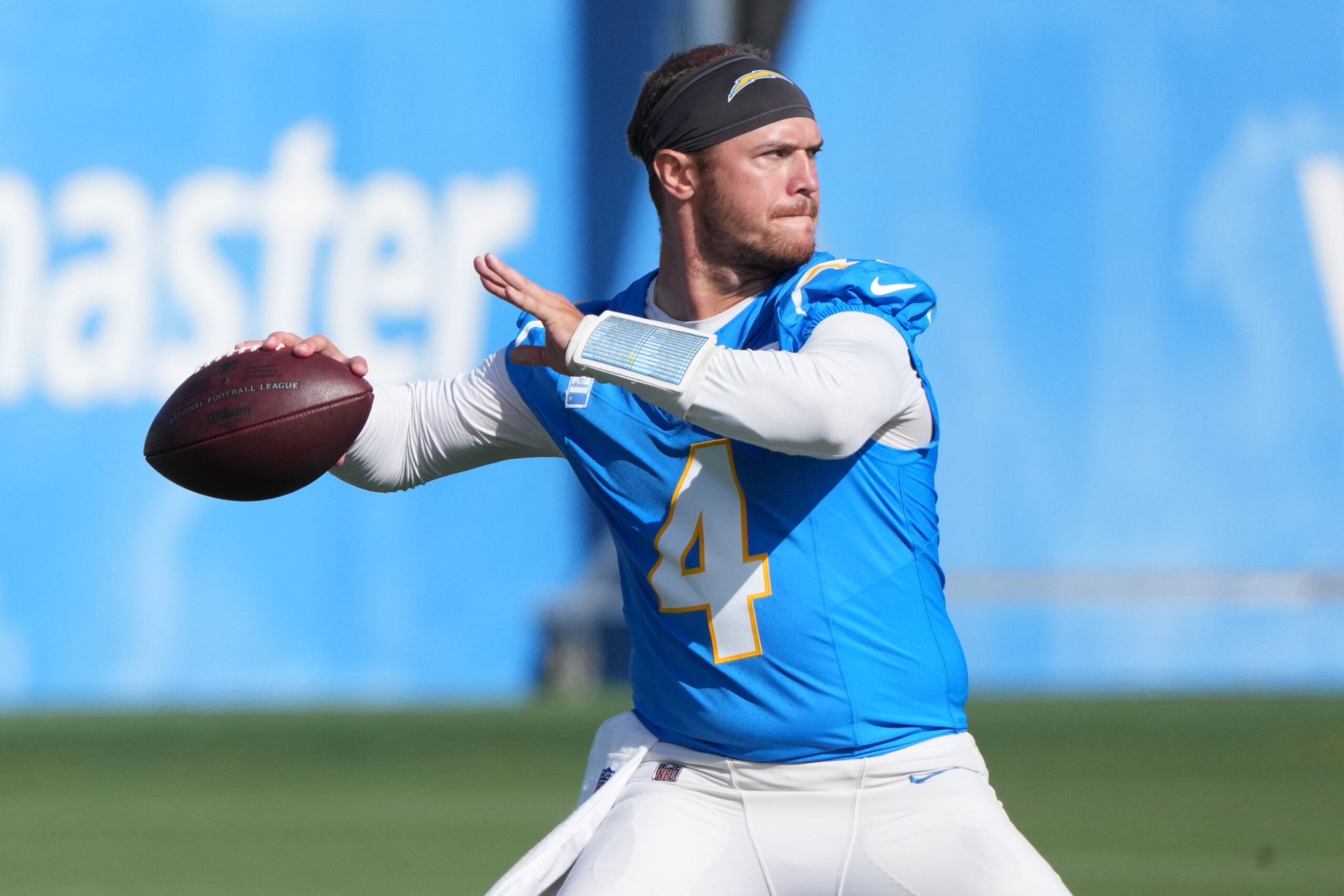 Jul 25, 2025; El Segundo, CA, USA; Los Angeles Chargers quarterback Taylor Heinicke (4) throws the ball during training camp at The Bolt. Mandatory Credit: Kirby Lee-Imagn Images