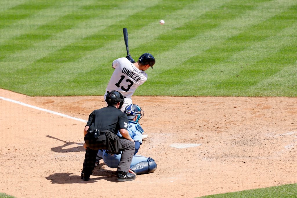 Jul 27, 2025; Detroit, Michigan, USA; Detroit Tigers catcher Dillon Dingler (13) hits a three RBI single in the eighth inning at Comerica Park. Mandatory Credit: Rick Osentoski-Imagn Images