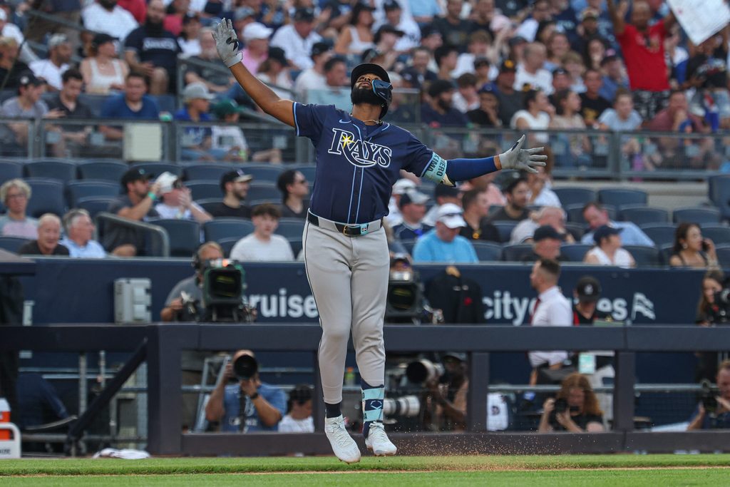 Jul 28, 2025; Bronx, New York, USA; Tampa Bay Rays third baseman Junior Caminero (13) reacts while running the bases after his two run home run during the first inning against the New York Yankees at Yankee Stadium. Mandatory Credit: Vincent Carchietta-Imagn Images