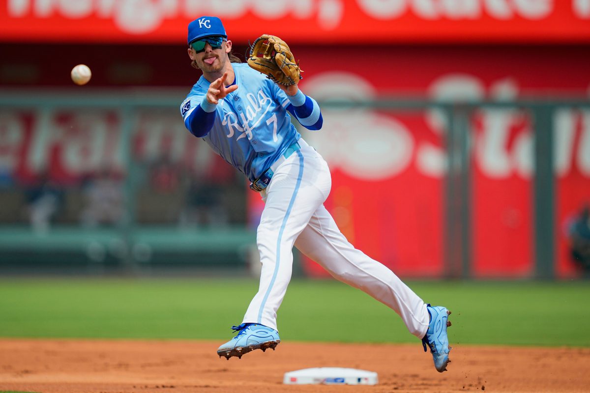 Jul 30, 2025; Kansas City, Missouri, USA; Kansas City Royals shortstop Bobby Witt Jr. (7) throws to first base during the first inning against the Atlanta Braves at Kauffman Stadium. Mandatory Credit: Jay Biggerstaff-Imagn Images