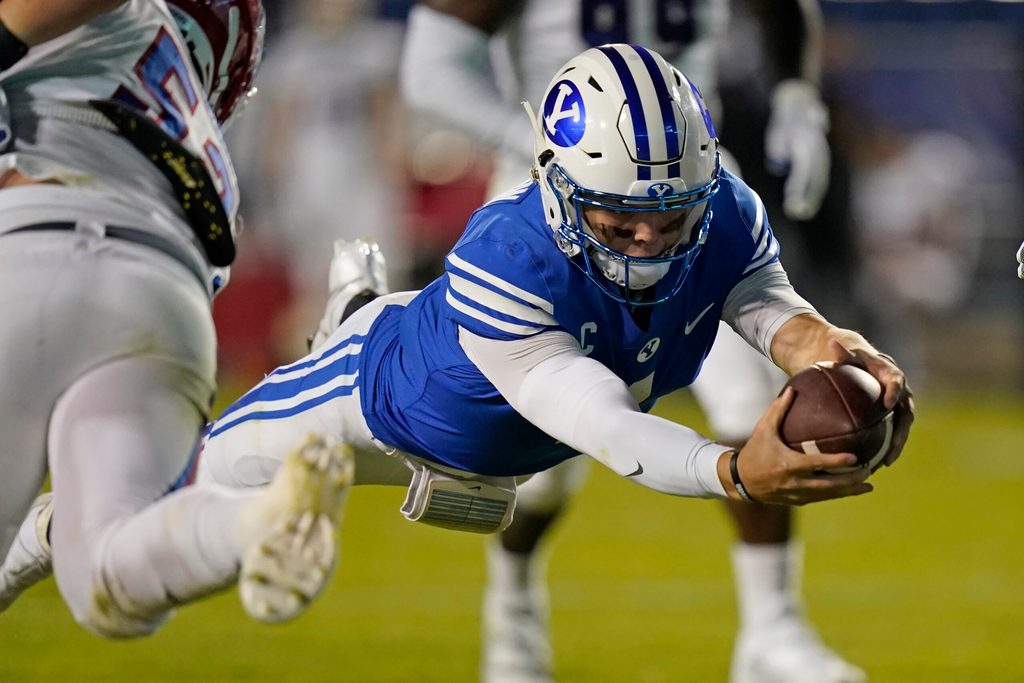 Oct 2, 2020; Provo, UT, USA; BYU quarterback Zach Wilson (1)scores against Louisiana Tech in the second half during an NCAA college football game Friday, Oct. 2, 2020, in Provo, Utah. Mandatory Credit: Rick Bowmer/Pool Photo-Imagn Images