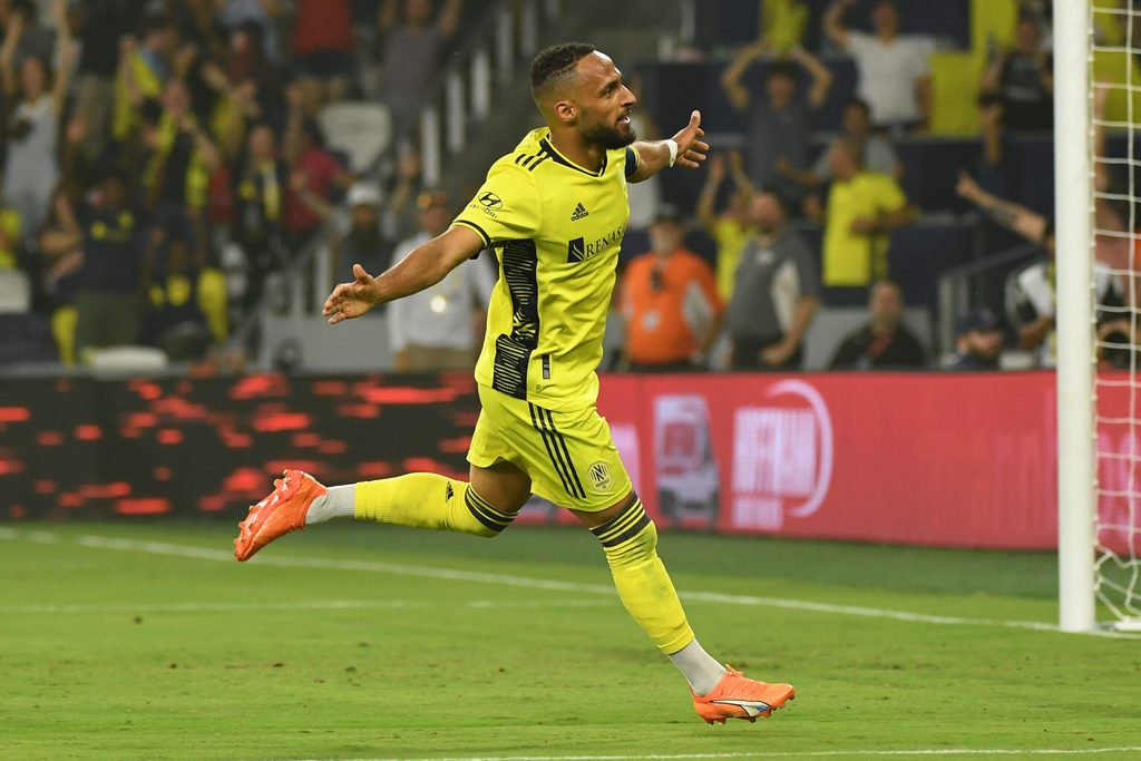 Jun 17, 2023; Nashville, Tennessee, USA; Nashville SC midfielder Hany Mukhtar (10) celebrates after scoring a goal against St. Louis City during the second half at Geodis Park. Mandatory Credit: Christopher Hanewinckel-Imagn Images