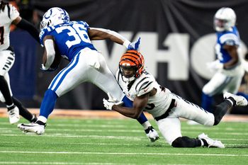 Cincinnati Bengals cornerback Josh Newton (28) attempts to tackle Indianapolis Colts running back Demetric Felton (36) in the fourth quarter of the NFL preseason game at Paycor Stadium in Cincinnati on Thursday, Aug. 22, 2024.