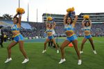 Sep 14, 2024; Pasadena, California, USA; UCLA Bruins cheerleaders perform during the game against the Indiana Hoosiers at Rose Bowl. Mandatory Credit: Kirby Lee-Imagn Images