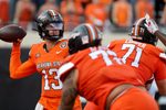 Oklahoma State's Garret Rangel (13) looks to throw the ball in the second half of the college football between the Oklahoma State University Cowboys and the Utah Utes at Boone Pickens Stadium in Stillwater, Okla., Saturday, Sept., 21, 2024.
