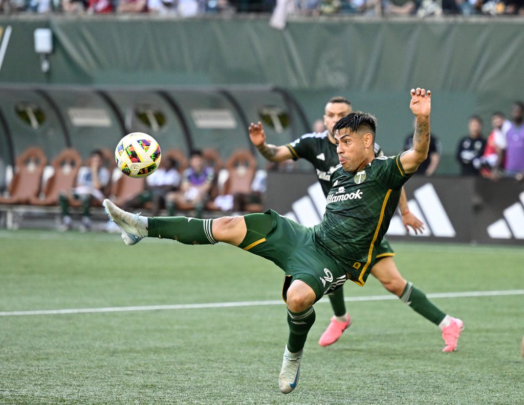 Oct 6, 2024; Portland, Oregon, USA; Portland Timbers forward Felipe Mora (9) kicks a shot on goal during the second half against FC Dallas at Providence Park. Mandatory Credit: Troy Wayrynen-Imagn Images