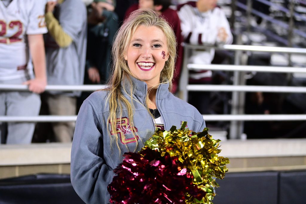 Oct 25, 2024; Chestnut Hill, Massachusetts, USA; A Boston College Eagles cheerleader poses for a photo during the first half against the Louisville Cardinals at Alumni Stadium. Mandatory Credit: Eric Canha-Imagn Images