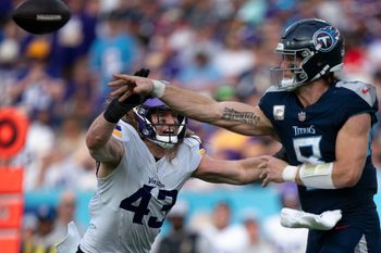 Minnesota Vikings linebacker Andrew Van Ginkel (43) pressures Tennessee Titans quarterback Will Levis (8) on a throw in the second half at Nissan Stadium in Nashville, Tenn., Sunday, Nov. 17, 2024.