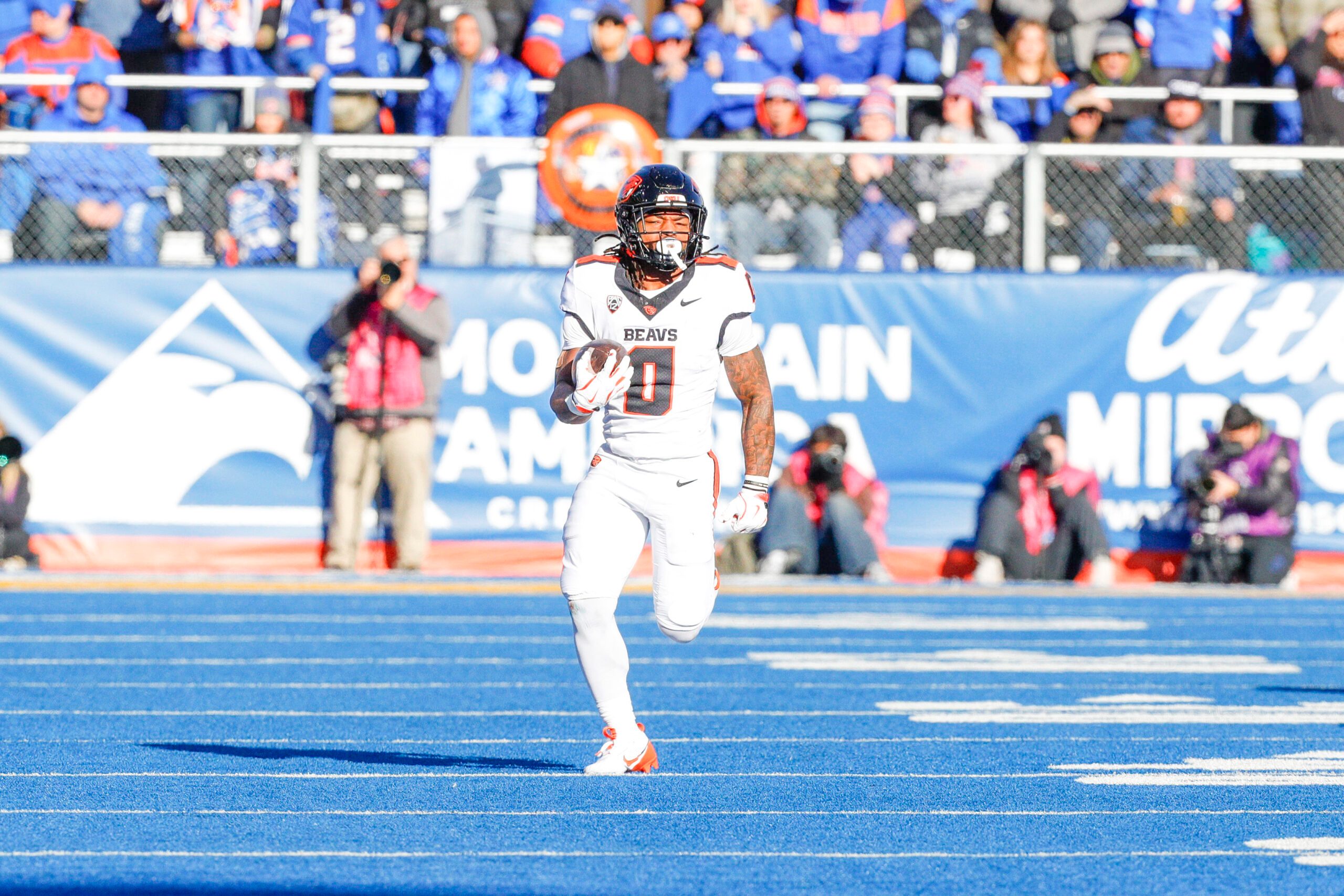 Nov 29, 2024; Boise, Idaho, USA; Oregon State Beavers running back Anthony Hankerson (0) runs for an 83 yard touchdown during the second quarter against the Boise State Broncos at Albertsons Stadium. Mandatory Credit: Brian Losness-Imagn Images
