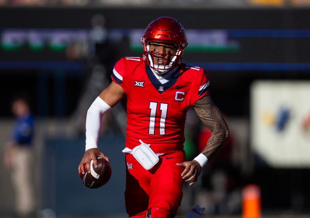 Nov 30, 2024; Tucson, Arizona, USA; Arizona Wildcats quarterback Noah Fifita (11) against the Arizona State Sun Devils during the Territorial Cup at Arizona Stadium. Mandatory Credit: Mark J. Rebilas-Imagn Images