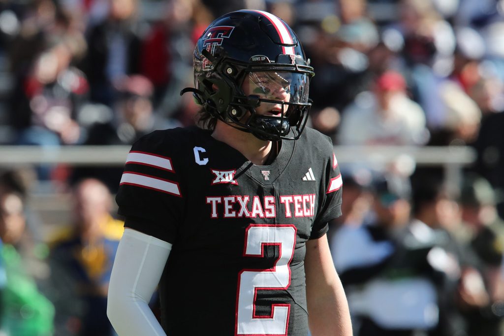 Nov 30, 2024; Lubbock, Texas, USA; Texas Tech Red Raiders quarterback Behren Morton (2) in the first half during the game against the West Virginia Mountaineers at Jones AT&T Stadium and Cody Campbell Field. Mandatory Credit: Michael C. Johnson-Imagn Images