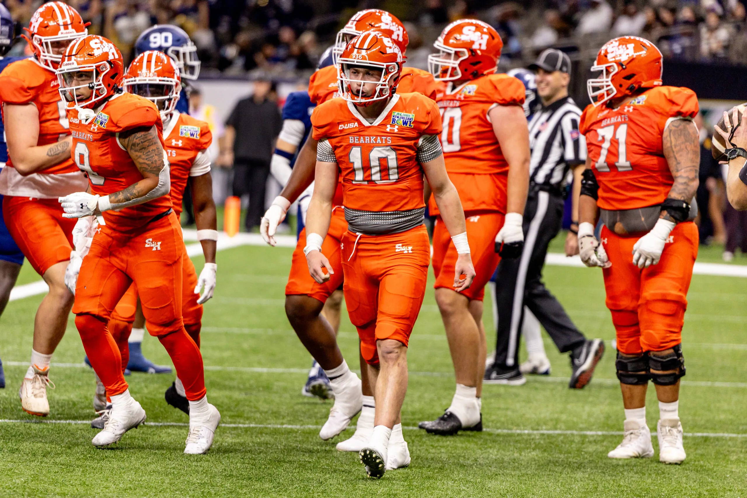 Dec 19, 2024; New Orleans, LA, USA;  Sam Houston State Bearkats quarterback Hunter Watson (10) reacts to scoring a touchdown against the Georgia Southern Eagles during the first half at Caesars Superdome. Mandatory Credit: Stephen Lew-Imagn Images