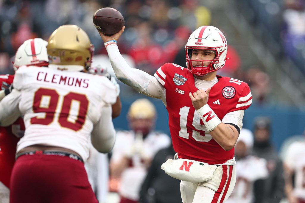 Dec 28, 2024; Bronx, NY, USA; Nebraska Cornhuskers quarterback Dylan Raiola (15) throws the ball during the second half against the Boston College Eagles at Yankee Stadium. Mandatory Credit: Vincent Carchietta-Imagn Images
