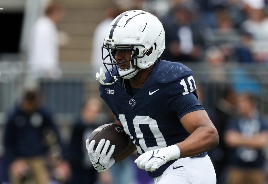 Apr 26, 2025; University Park, PA, USA; Penn State Nittany Lions running back Nicholas Singleton (10) runs a play during a warm up prior to the Blue White spring game at Beaver Stadium. Mandatory Credit: Matthew O'Haren-Imagn Images