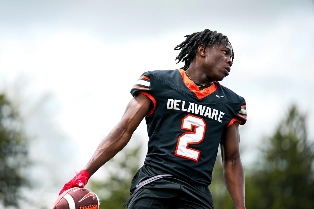 Delaware Hayes’s Favour Akih (2) participates in a drill during the college football showcase at the Delaware Hayes High School on Wednesday, May 7, 2025 in Delaware, Ohio.