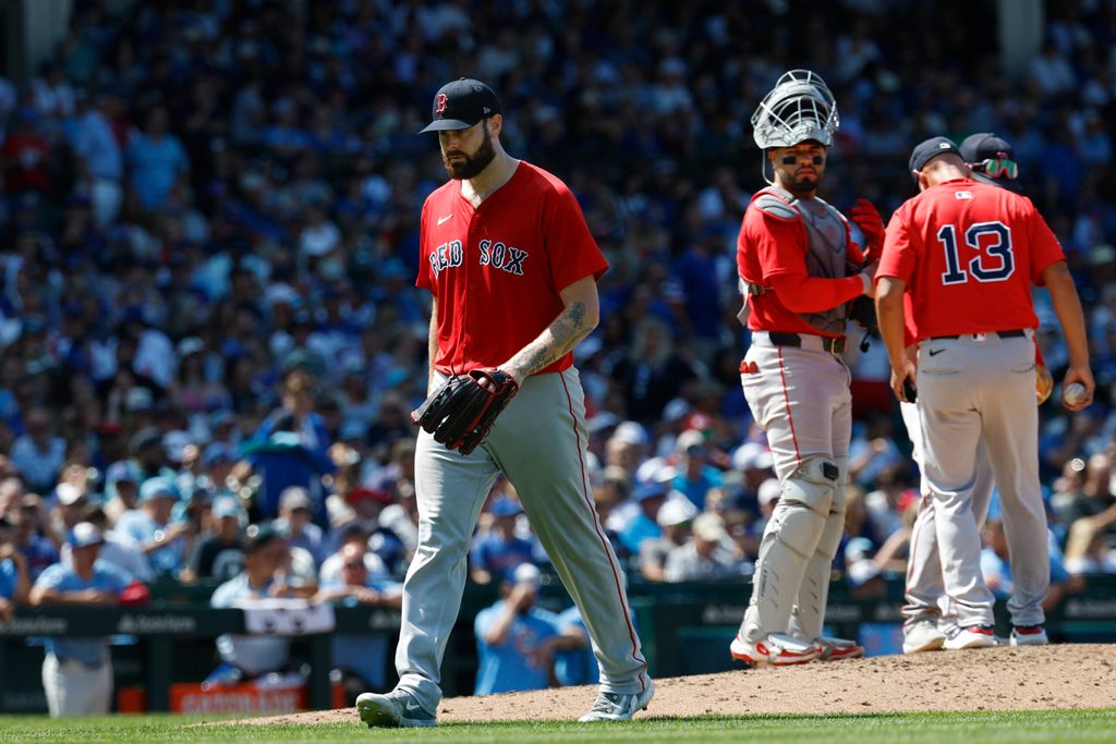 Jul 18, 2025; Chicago, Illinois, USA; Boston Red Sox starting pitcher Lucas Giolito (54) leaves a baseball game against the Chicago Cubs during the sixth inning at Wrigley Field. Mandatory Credit: Kamil Krzaczynski-Imagn Images