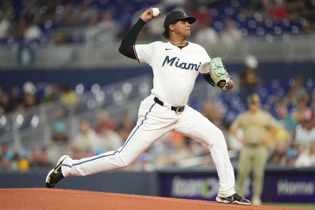 Jul 22, 2025; Miami, Florida, USA; Miami Marlins pitcher Edward Cabrera (27) pitches in the first inning against the San Diego Padres at loanDepot Park. Mandatory Credit: Jim Rassol-Imagn Images