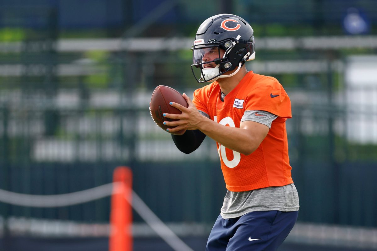Jul 24, 2025; Lake Forest, IL, USA; Chicago Bears quarterback Caleb Williams (18) looks to pass the ball during training camp at Halas Hall. Mandatory Credit: Kamil Krzaczynski-Imagn Images