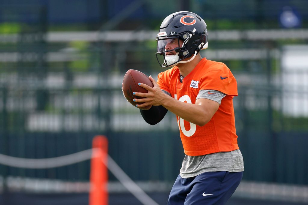 Jul 24, 2025; Lake Forest, IL, USA; Chicago Bears quarterback Caleb Williams (18) looks to pass the ball during training camp at Halas Hall. Mandatory Credit: Kamil Krzaczynski-Imagn Images
