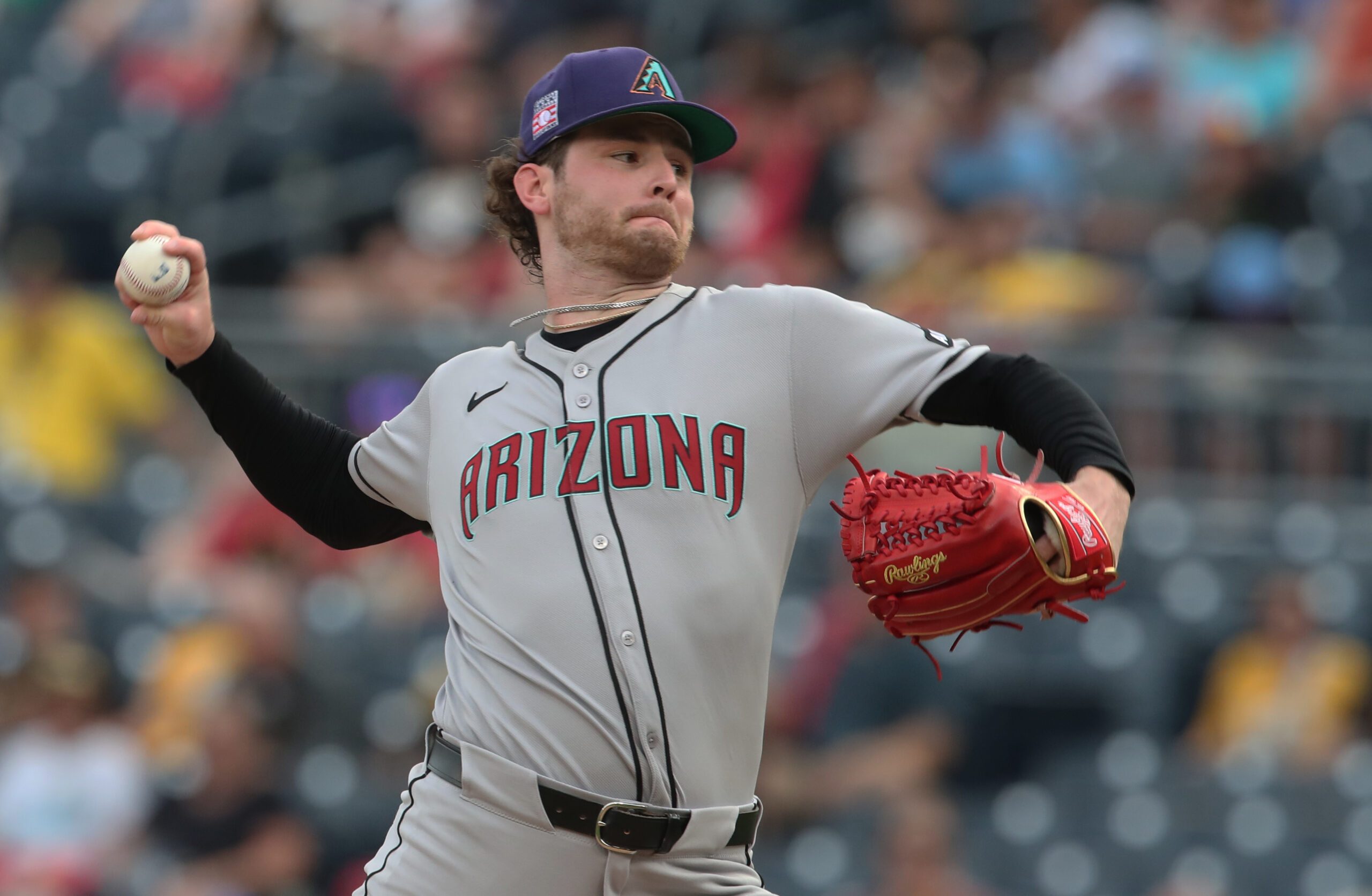 Jul 25, 2025; Pittsburgh, Pennsylvania, USA; Arizona Diamondbacks starting pitcher Ryne Nelson (19) delivers a pitch against the Pittsburgh Pirates during the first inning at PNC Park. Mandatory Credit: Charles LeClaire-Imagn Images