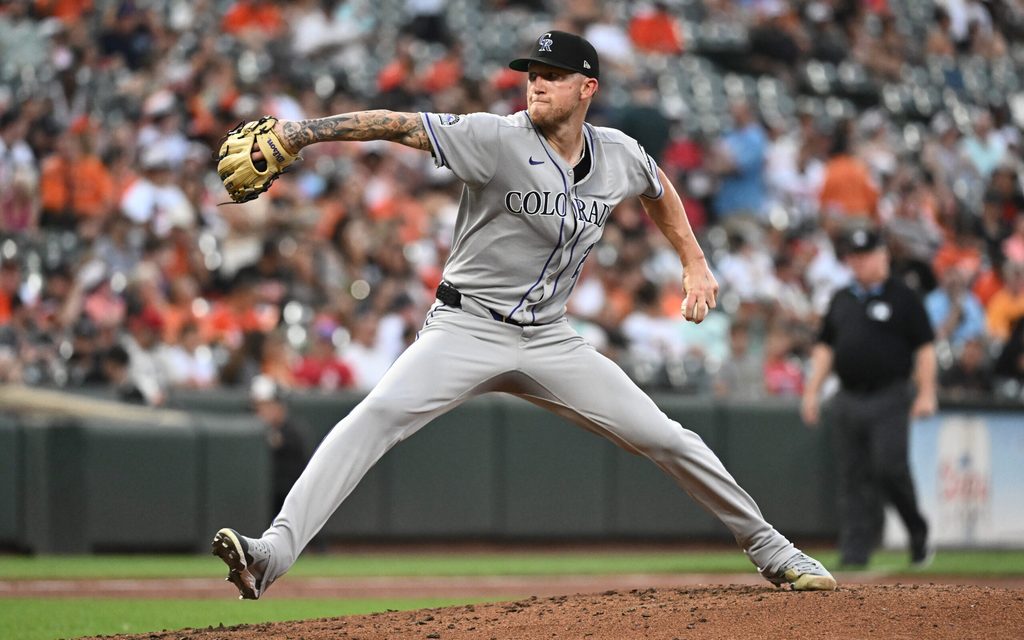 Jul 25, 2025; Baltimore, Maryland, USA; Colorado Rockies pitcher Kyle Freeland (21) delivers a pitch during the second inning against the Baltimore Orioles at Oriole Park at Camden Yards. Mandatory Credit: James A. Pittman-Imagn Images