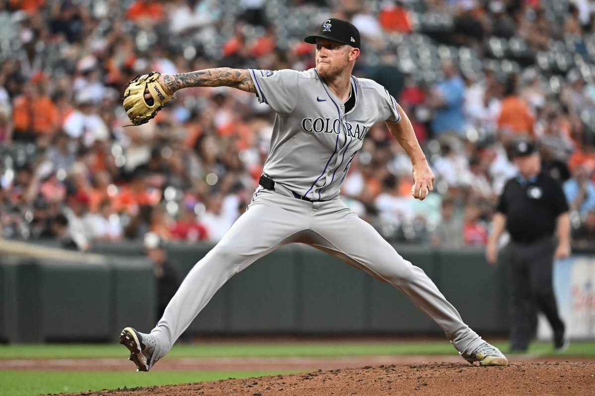 Jul 25, 2025; Baltimore, Maryland, USA; Colorado Rockies pitcher Kyle Freeland (21) delivers a pitch during the second inning against the Baltimore Orioles at Oriole Park at Camden Yards. Mandatory Credit: James A. Pittman-Imagn Images