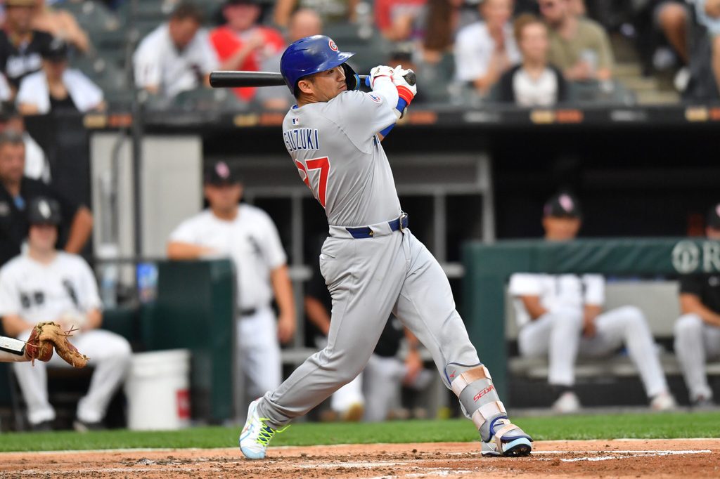 Jul 26, 2025; Chicago, Illinois, USA; Chicago Cubs designated hitter Seiya Suzuki (27) hits a single during the fourth inning against the Chicago White Sox at Rate Field. Mandatory Credit: Patrick Gorski-Imagn Images