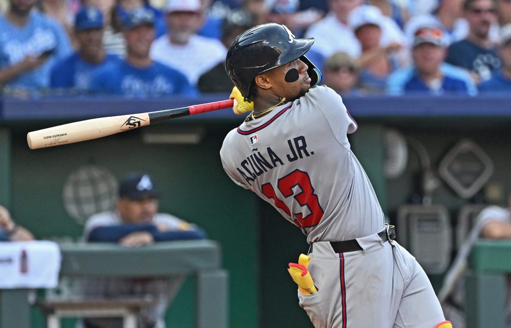 Jul 28, 2025; Kansas City, Missouri, USA; Atlanta Braves right fielder Ronald Acuna Jr. (13) hits a two-run home run in the third inning against the Kansas City Royals at Kauffman Stadium. Mandatory Credit: Peter Aiken-Imagn Images