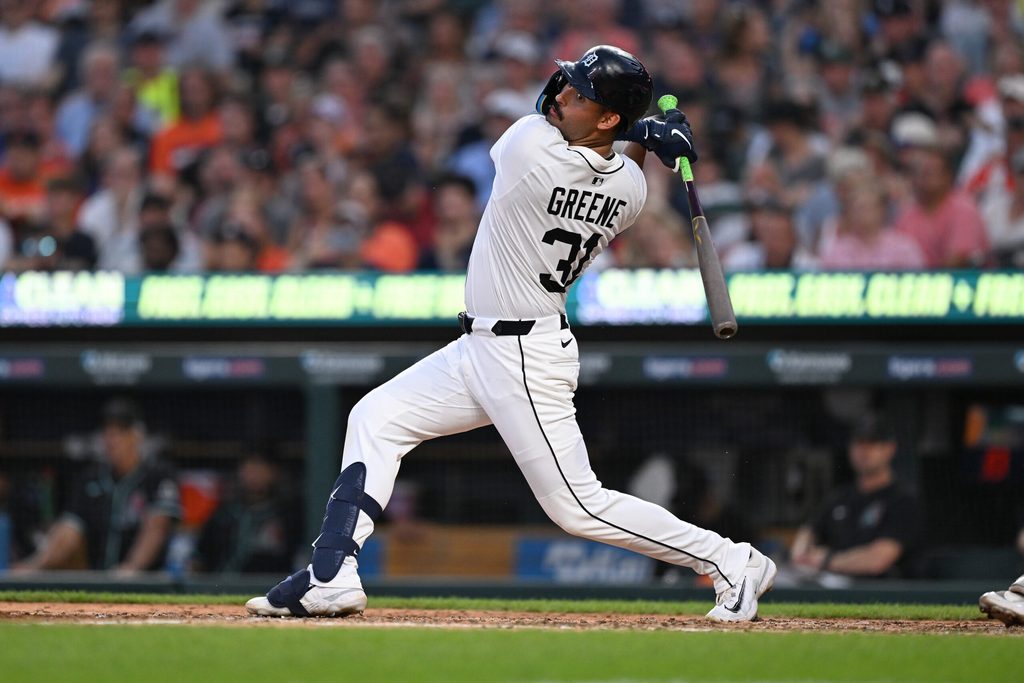 Jul 29, 2025; Detroit, Michigan, USA; Detroit Tigers left fielder Riley Greene (31) hits an RBI double against the Arizona Diamondbacks in the sixth inning at Comerica Park. Mandatory Credit: Lon Horwedel-Imagn Images