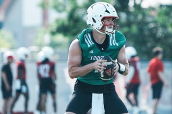 Louisville Cardinals quarterback Miller Moss during a morning practice Wednesday, July 30, 2025. Moss transferred from USC. His overall QB rating is 81.4.