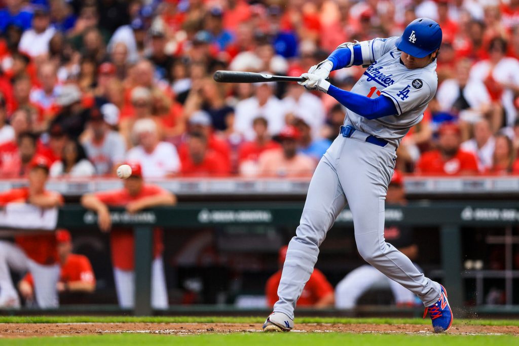 Jul 30, 2025; Cincinnati, Ohio, USA; Los Angeles Dodgers designated hitter Shohei Ohtani (17) bats in the fourth inning against the Cincinnati Reds at Great American Ball Park. Mandatory Credit: Katie Stratman-Imagn Images
